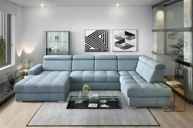 U-shaped sofa in a minimalist living room with neutral colors